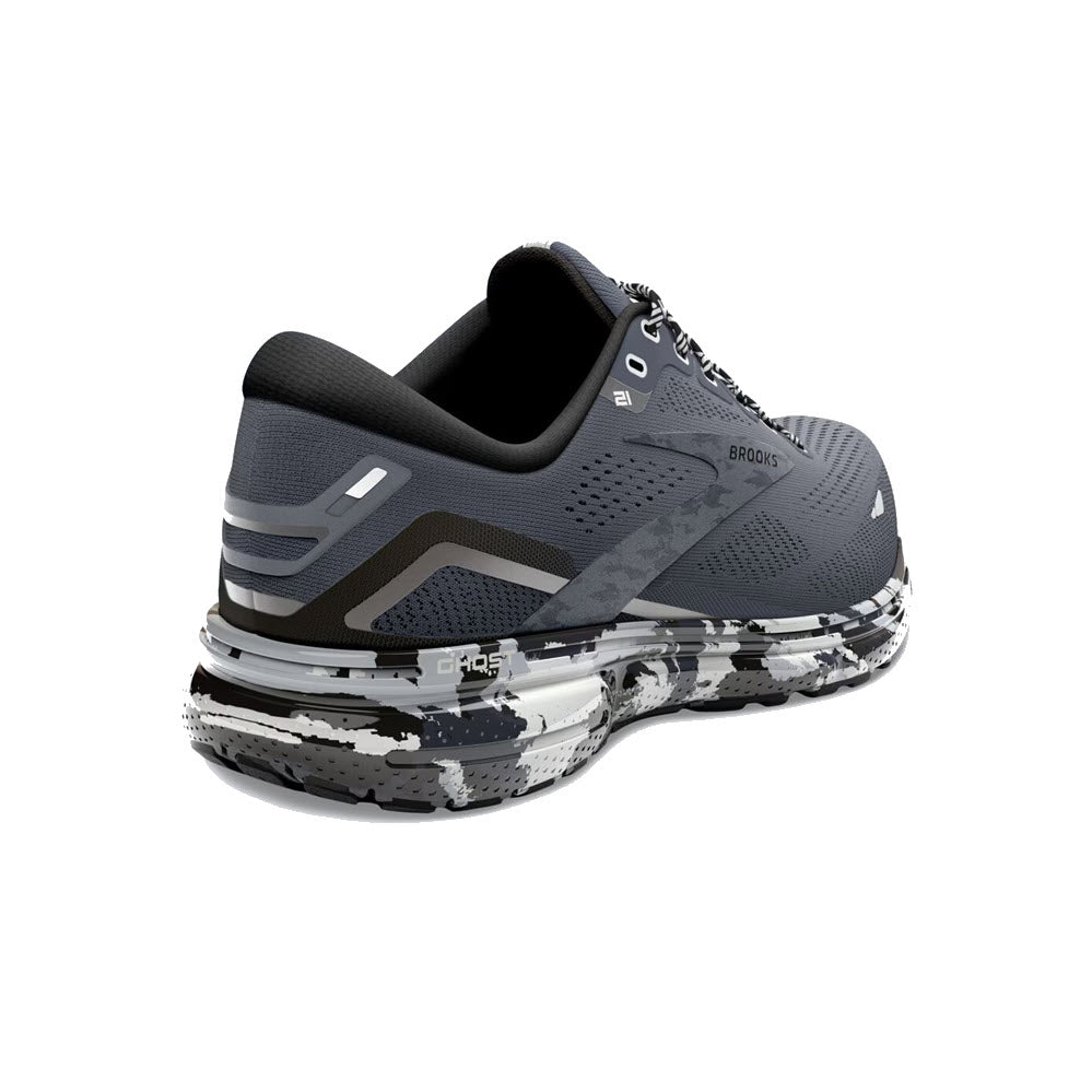 A single Brooks Ghost 15 Ebony/Black/Oyster running shoe featuring a dark gray color with a splattered white and gray sole design and soft cushioning.