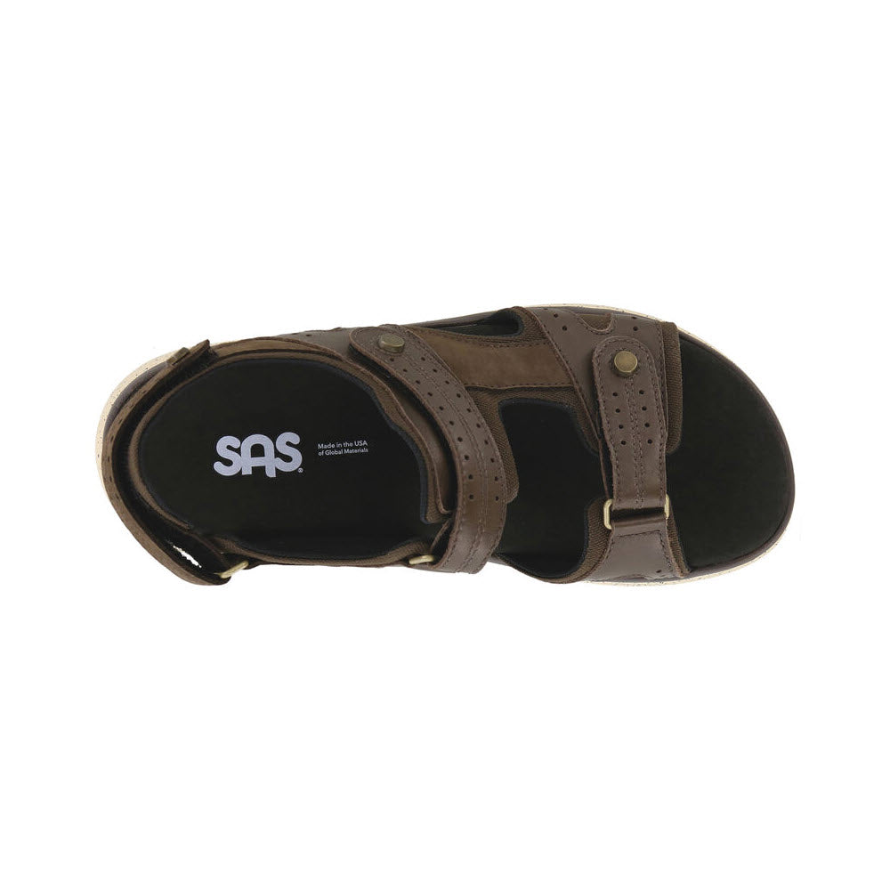 Top view of a brown leather SAS EMBARK sandal with adjustable straps and a cushioned insole.