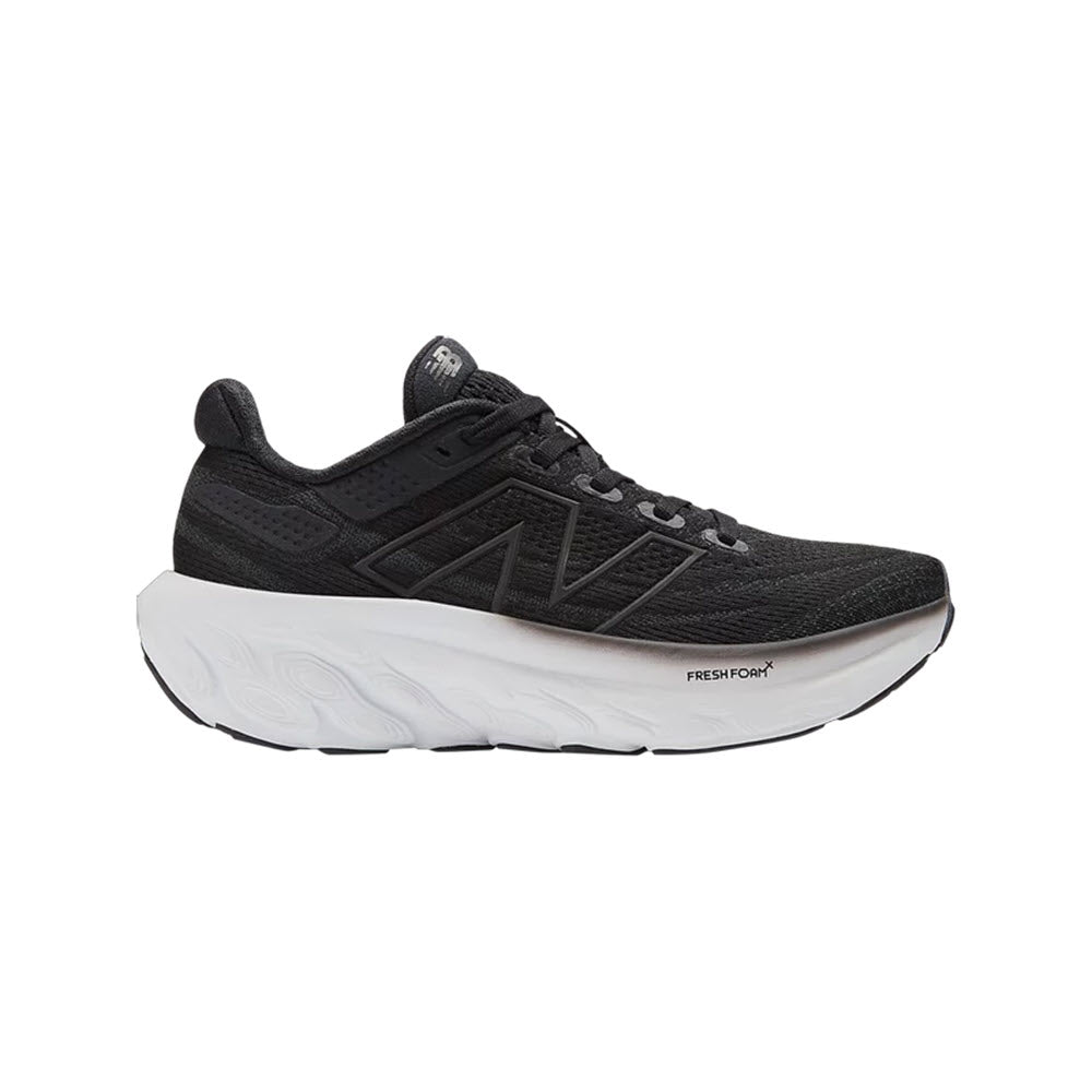 A single black and white New Balance 1080 V13 running shoe featuring an engineered mesh upper, thick white sole, and prominent logo on the side.