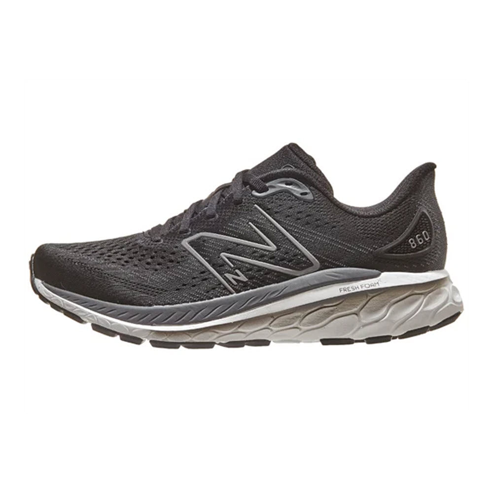 A single black New Balance 860V13 running shoe with white soles, featuring Fresh Foam X technology, viewed from the side.