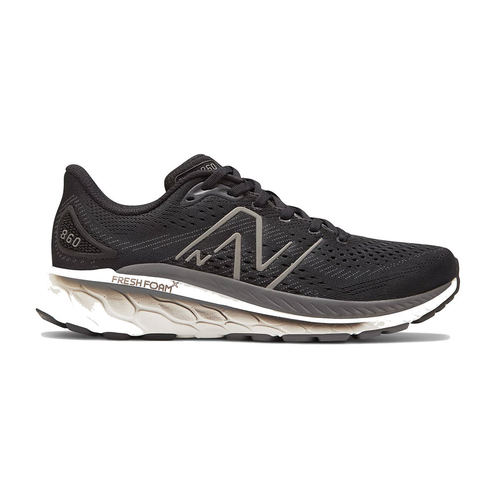 A black New Balance 860V13 stability running shoe with a white sole and the logo on the side.