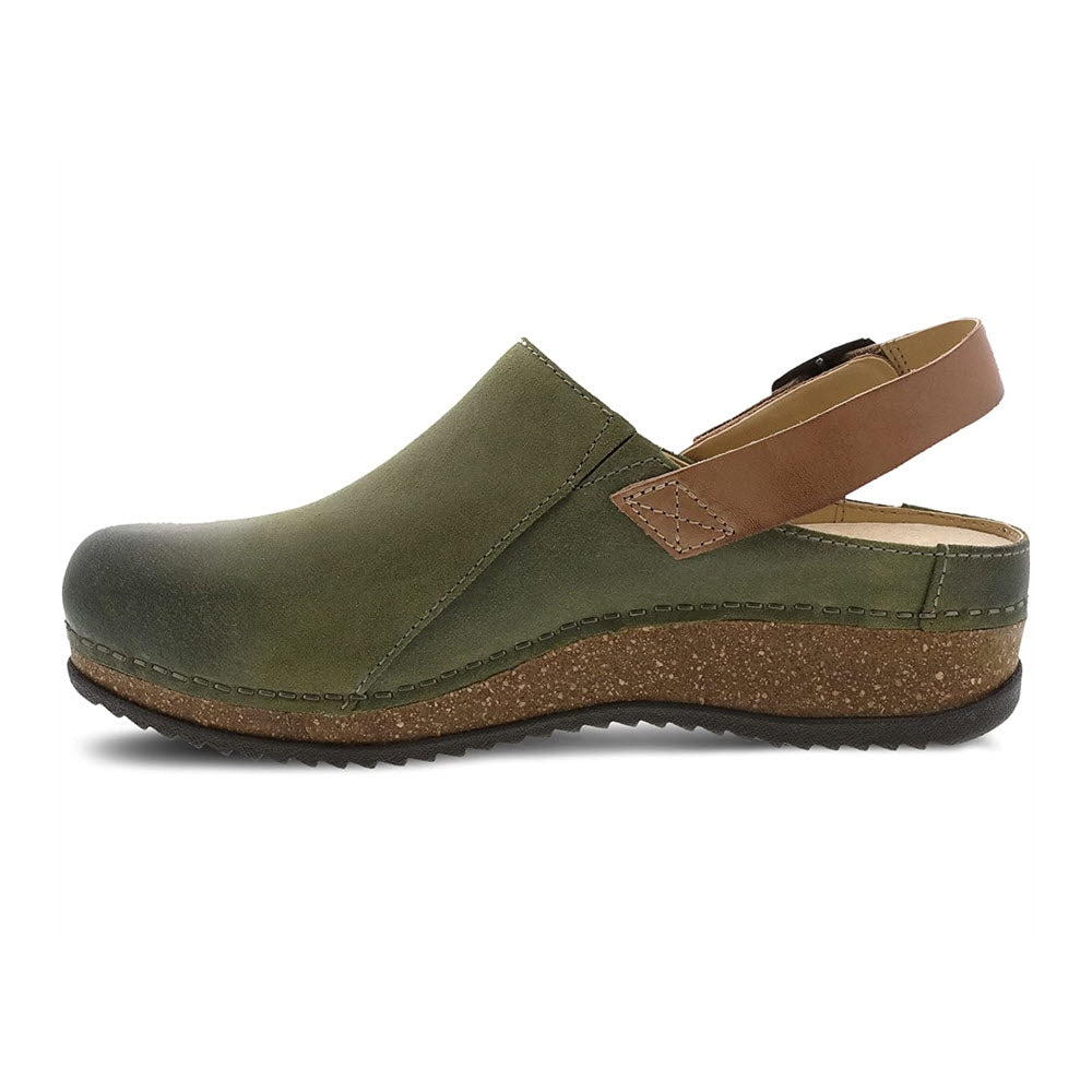 Dansko Merrin Olive green leather upper clog with brown trim and a hook-and-loop ankle strap on a cork sole, displayed against a white background.