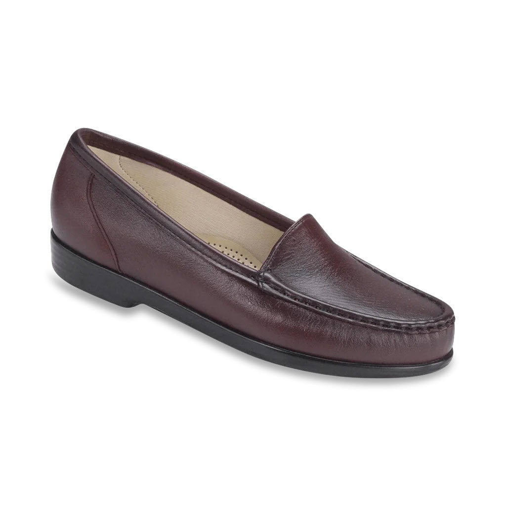 A SAS Simplify Antique Wine slip-on moccasin loafer with a low heel and round toe on a white background.