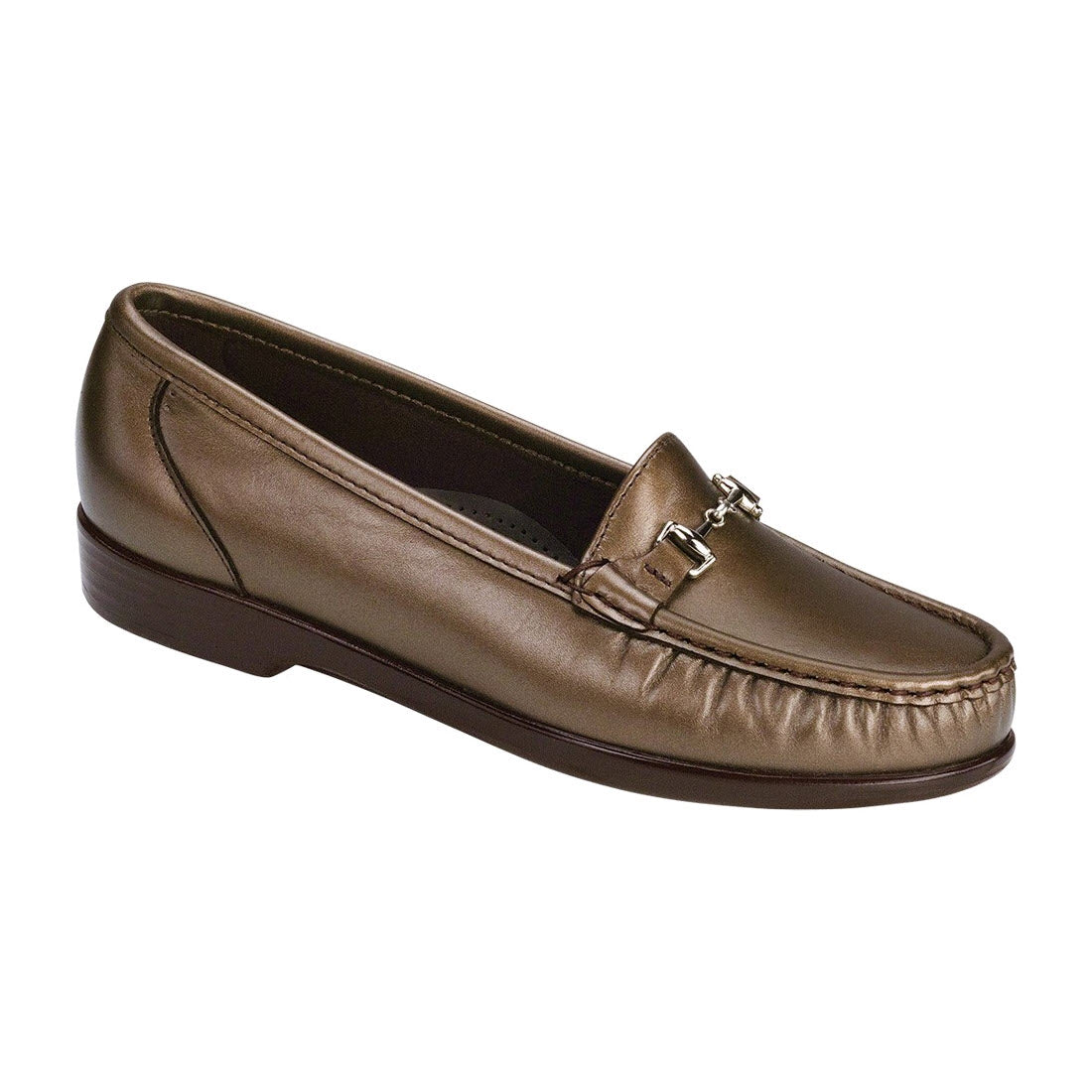 A brown leather SAS Metro Bronze slip-on loafer with a metal buckle and a low heel, isolated on a white background.