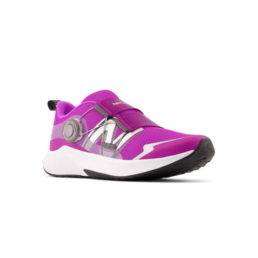 A purple and white sneaker with a modern, lace-free design, featuring a New Balance REVEAL BOA V4 COSMIC ROSE - KIDS Performance Fit System on the side for fit adjustment.