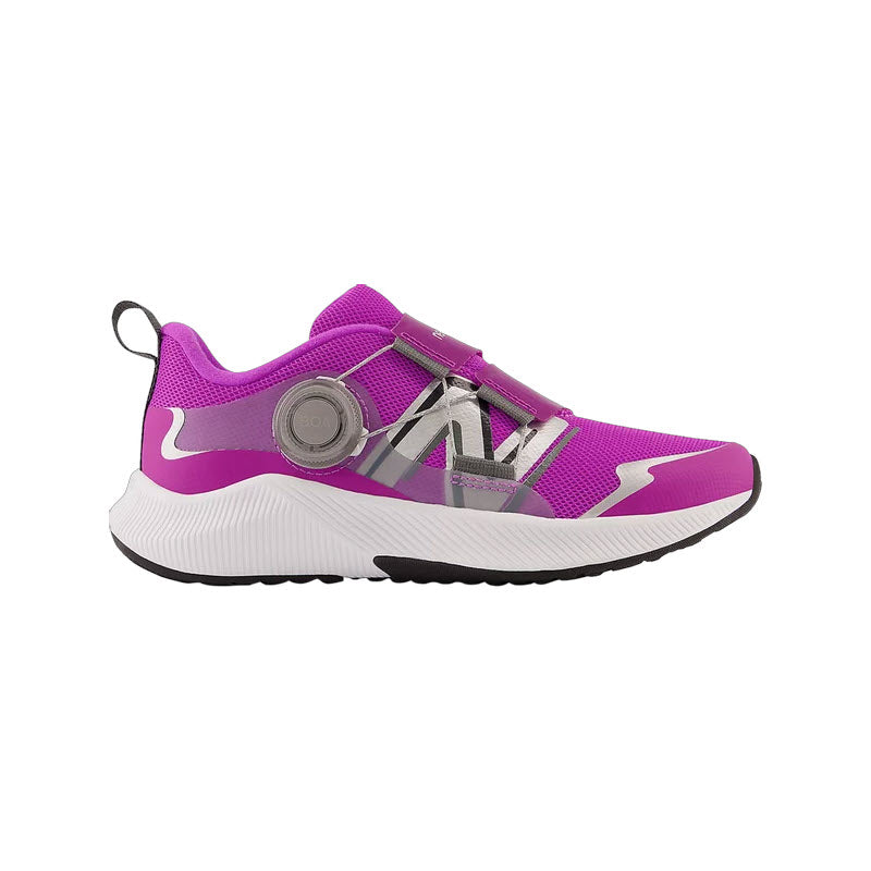 Bright pink and white New Balance REVEAL BOA V4 COSMIC ROSE - KIDS running shoe with silver accents and a BOA® Performance Fit System, displayed against a white background.
