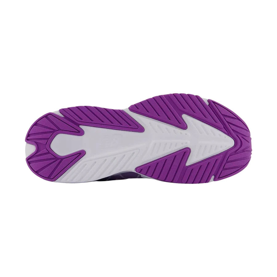 Sole of a New Balance Rave Run v2 Summer Fog Kids sports shoe with purple and white tread pattern, offering play-all-day support.