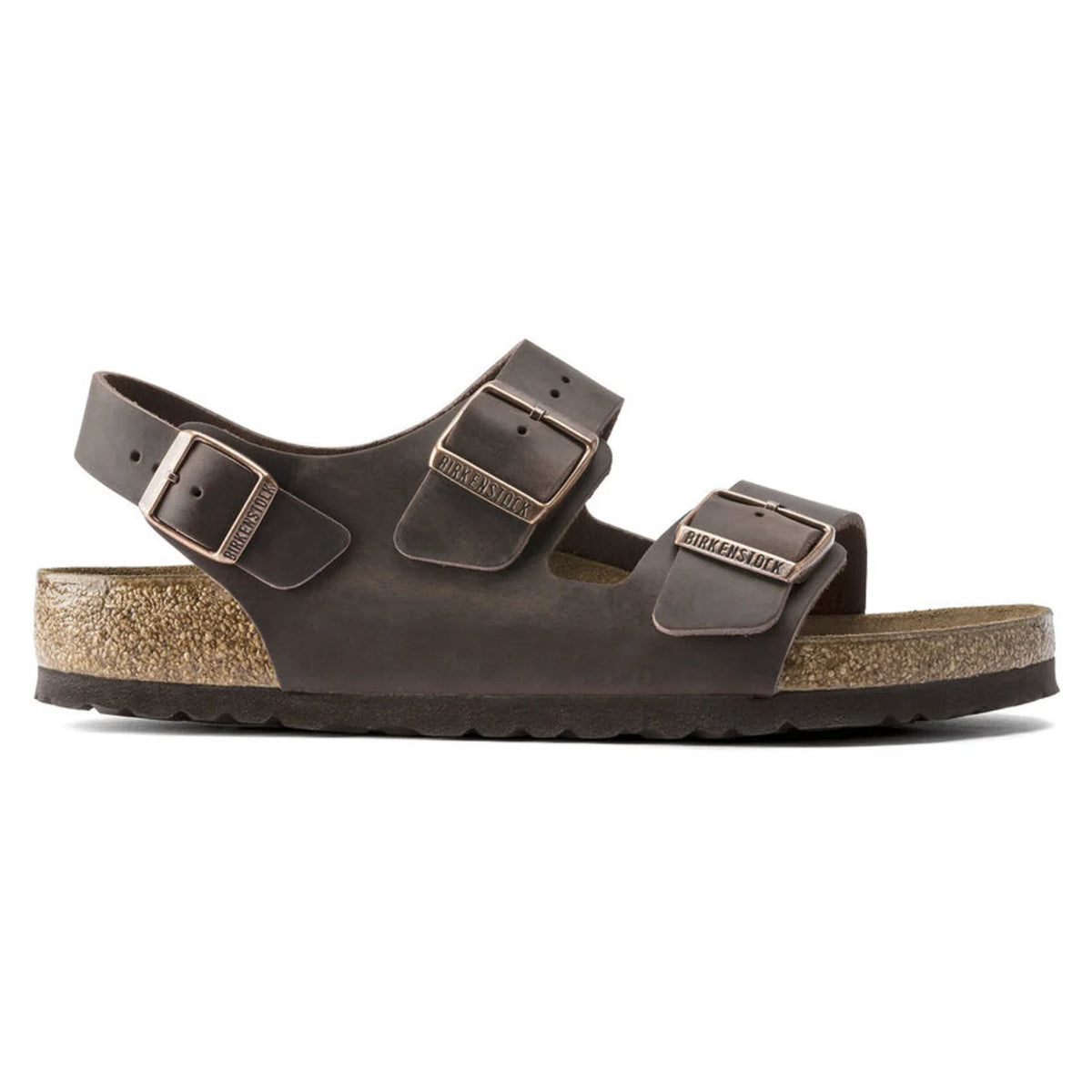 Brown leather Birkenstock Milano Oiled Leather Habana two-strap sandal with contoured cork footbed and buckle closures, isolated on white background.