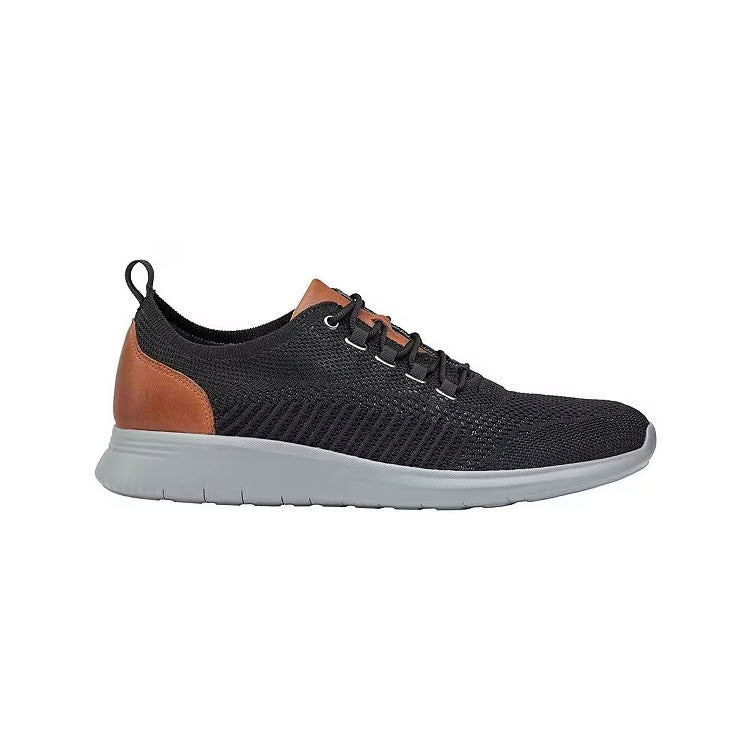 Johnston &amp; Murphy black and brown athletic shoe with a breathable sport knit upper and a white sole, displayed on a white background.
