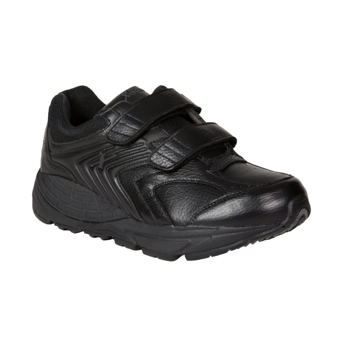 A black Xelero Matrix Strap athletic shoe with Velcro straps and a textured design, featuring a prominent star logo on the side.