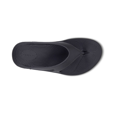 Black Oofos Ooriginal Thong sandal with patented footbed on a white background. 
Product: OOFOS OORIGINAL THONG BLACK - MENS 
Brand: Oofos