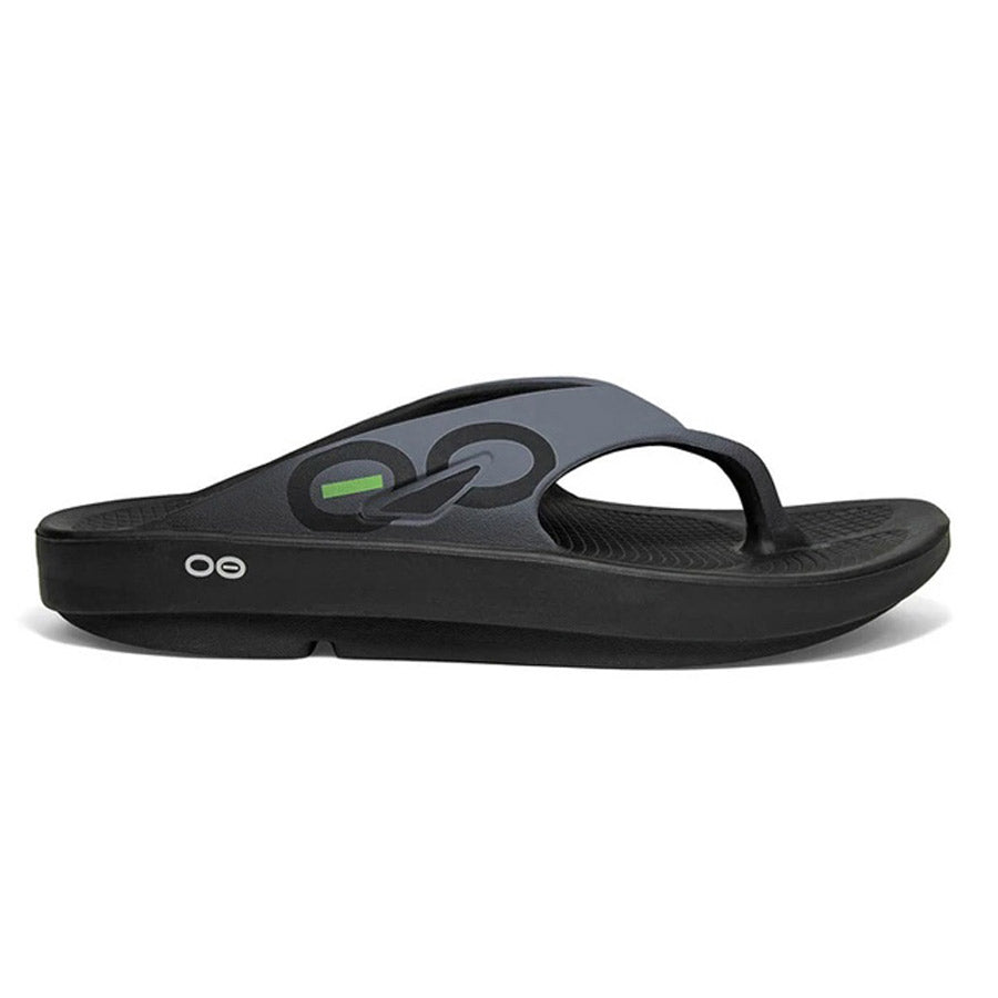 A single OOFOS OOriginal Sport Black/Graphite - Mens flip-flop with a distinctive oval logo on the strap, featuring arch support, is placed against a white background.