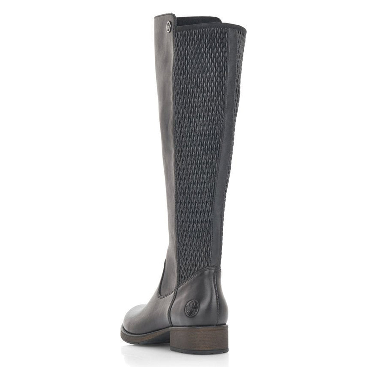 Rieker FAITH 91 black vegan leather riding boot with a textured, ribbed upper panel and circular emblem on the outer side, standing against a white background.