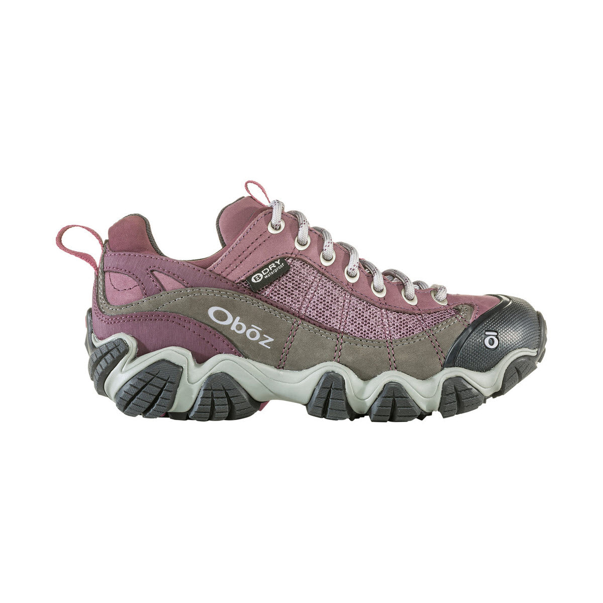 A pink and gray Oboz Firebrand II Low B Dry Lilac hiking shoe with a waterproof membrane, featuring a chunky sole, lace-up front, and pull tabs on the tongue and back.