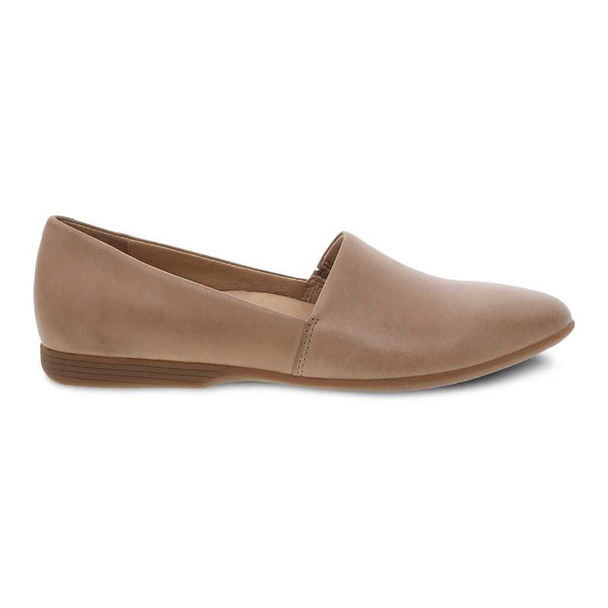 A single beige Dansko Larisa tan women&#39;s flat shoe with arch support against a white background.