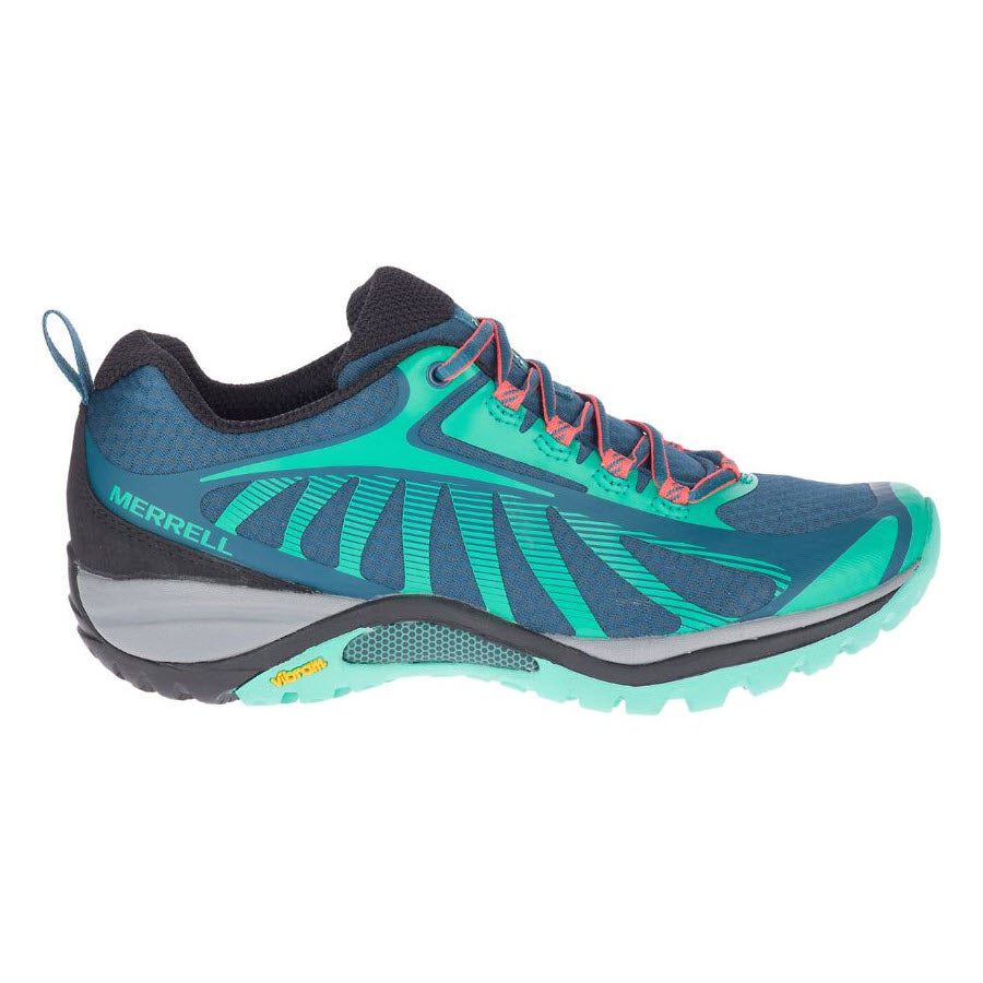 A Merrell women&#39;s hiking shoe with a blue and green upper, pink laces, and a gray Vibram Megagrip sole, isolated on a white background.