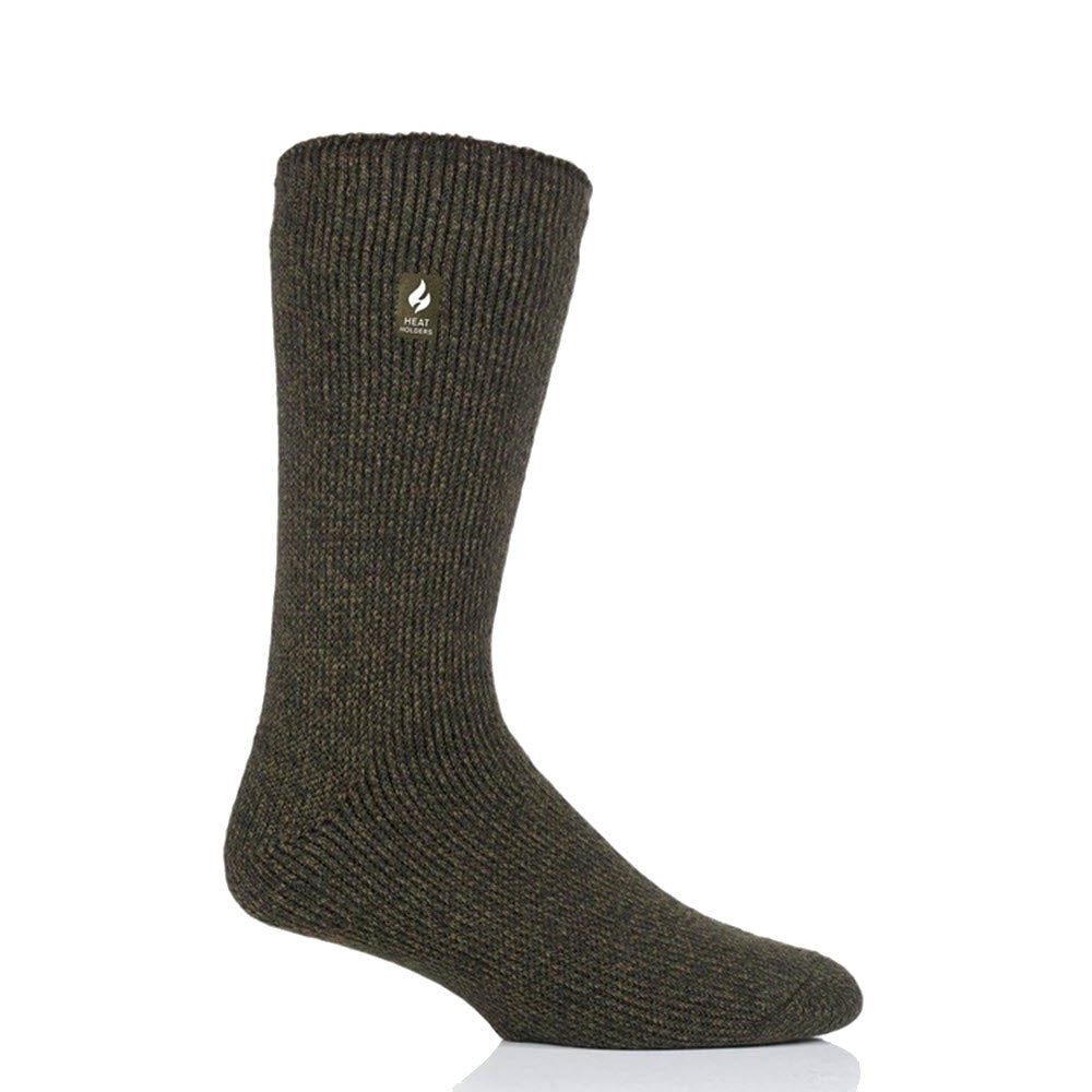 A single dark green wool sock with a ribbed texture, displayed upright against a white background. The HEATHOLDERS DUNNOCK ORIGINAL TWIST FOREST - MENS, known for being part of the Heatholders collection, has a small logo near the top.