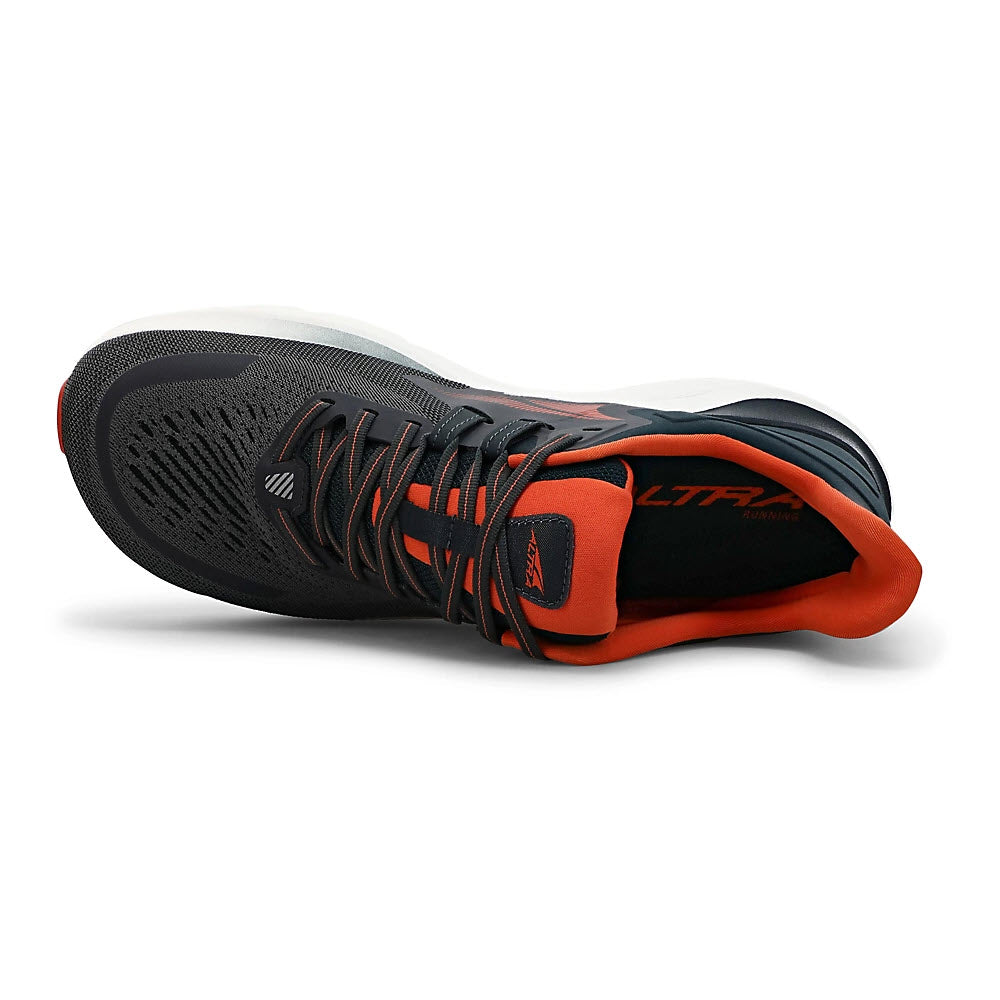 A side view of a gray and orange Altra Provision 6 stability trainer with laces.