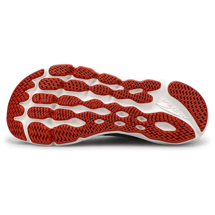 Red and white treaded sole of an Altra Provision 6 Black - Mens running shoe designed for overpronation support.