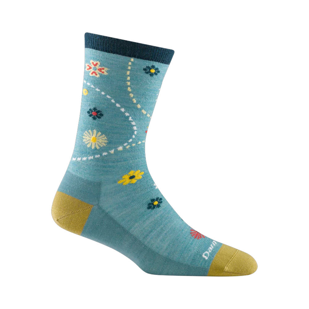 A single Darn Tough garden crew sock in aqua, with yellow toe and heel sections, decorated with floral and dotted patterns, displayed against a white background.