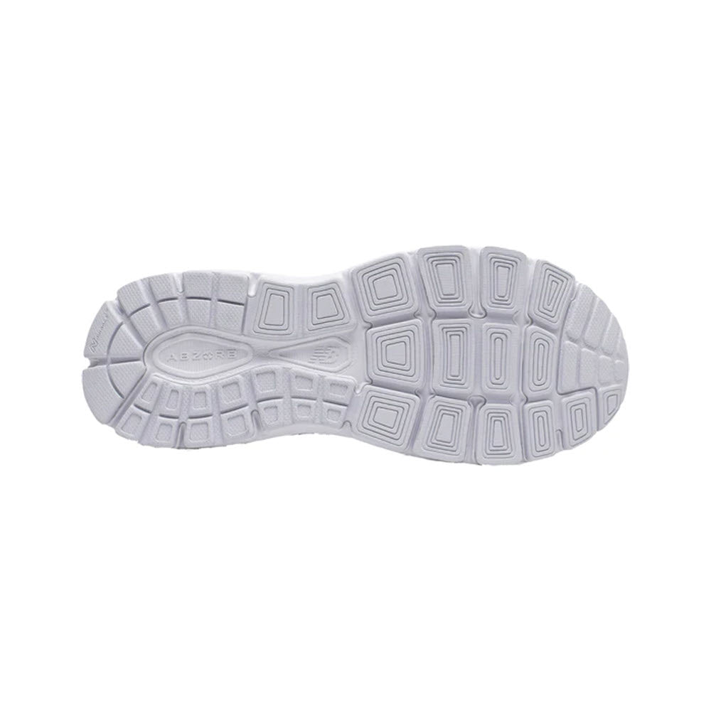 Bottom view of a New Balance W840V3 White/Silent Silver women&#39;s walking shoe sole with a hexagonal pattern design.