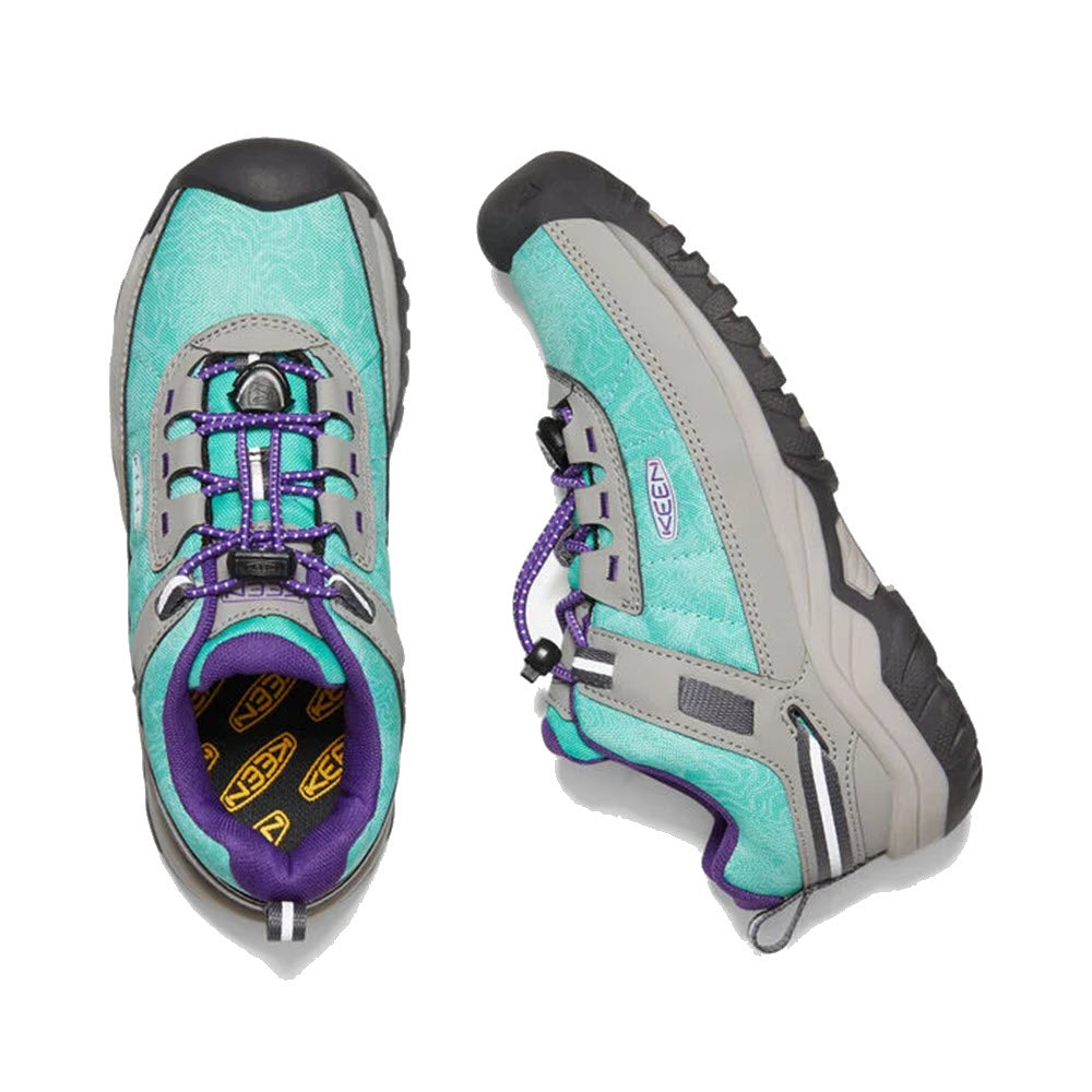 A pair of Keen Targhee Sport Waterfall - Kids hiking sneakers with purple laces, viewed from above with one shoe facing up and the other on its side.