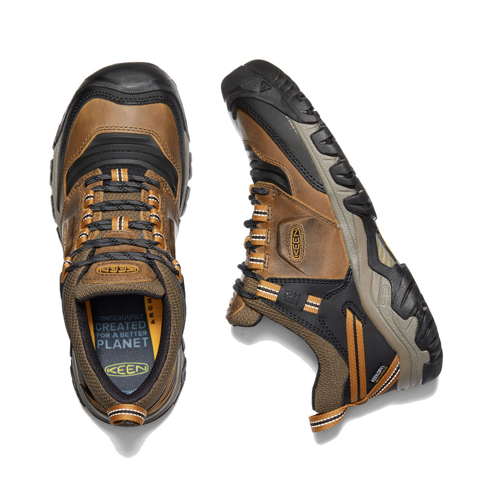 A pair of Keen Ridge Flex WP Bison hiking shoes displayed from above, featuring brown, black, and gray colors, with visible logos and rugged soles.
