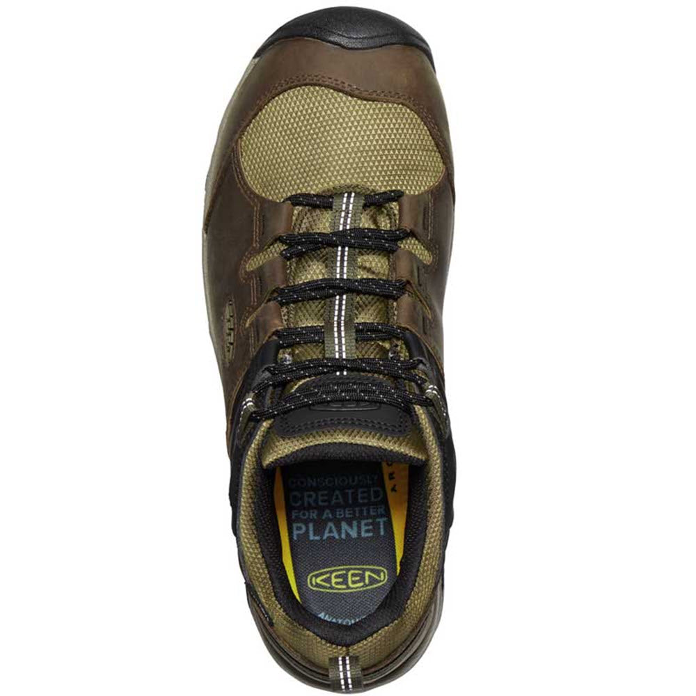 Top view of a Keen Steens Waterproof Brindle - Mens hiking shoe with black and yellow laces, featuring an eco-conscious label.