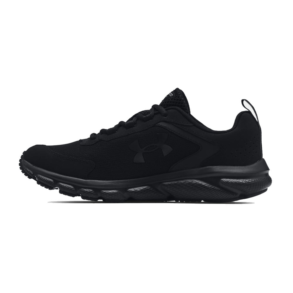 Sentence with replaced product name and brand name: Side view of a men&#39;s black Under Armour Charged Assert 9 sneaker with a textured sole and brand logo on the side.