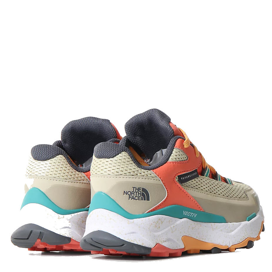A pair of North Face Vectiv Taraval Futurelight hiking shoes featuring waterproof breathable support, in gravel/coral sunrise colors, displayed against a white background.