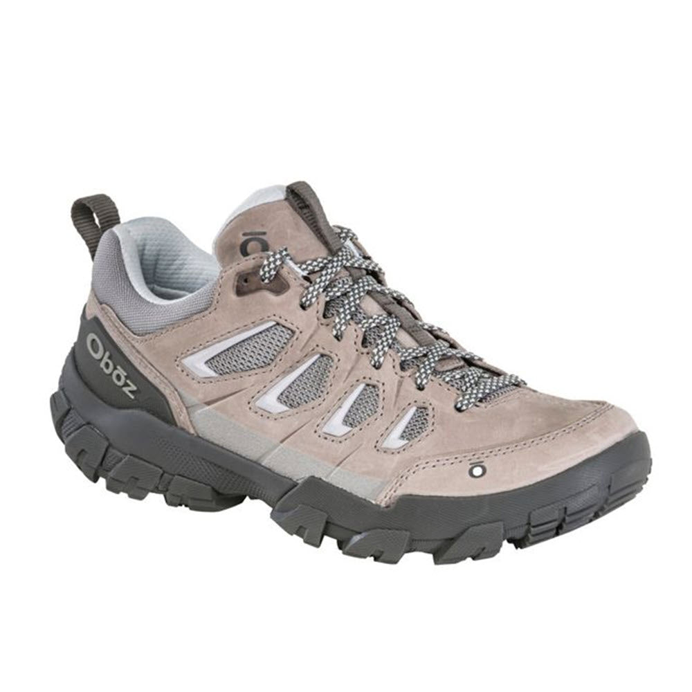 A single Oboz Sawtooth X Drizzle - Womens trail shoe with gray accents and a rugged, reliable traction sole, displayed on a white background.