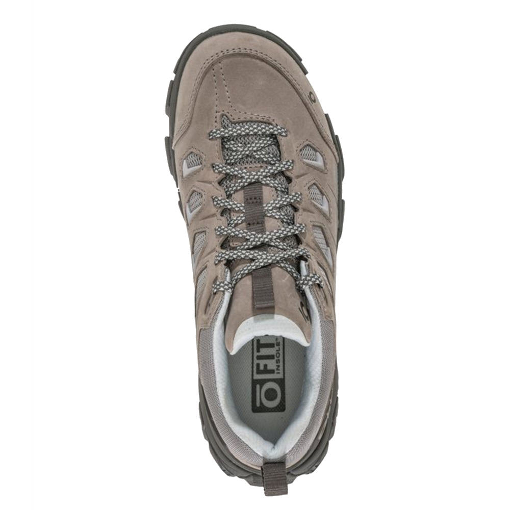 Top view of a single Oboz Sawtooth X Drizzle trail shoe with gray laces and a visible orthotic insole.