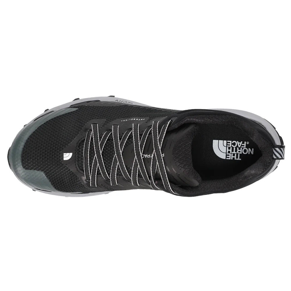 Top view of a black lightweight hiker with white laces and a visible North Face VECTIV Fastpack FUTURELIGHT logo on the insole.