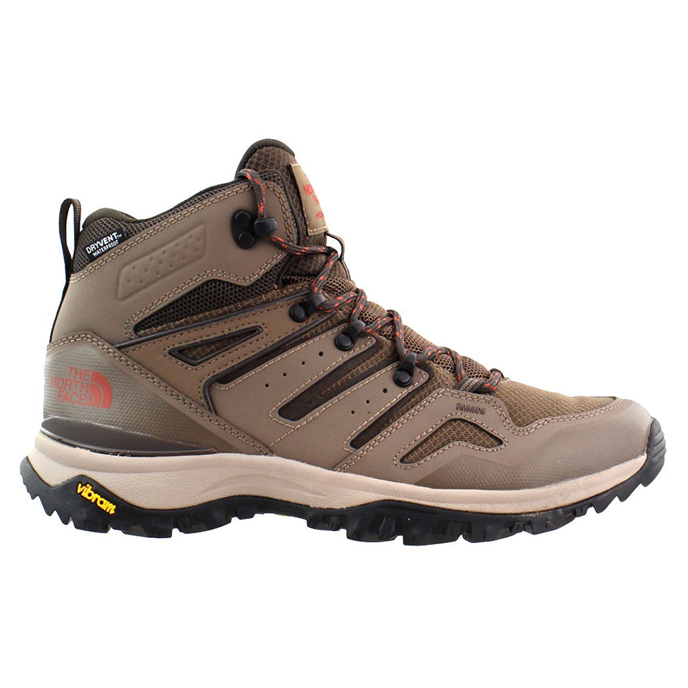 A single brown North Face Hedgehog Fastpack II Mid WP hiking boot with a high ankle, lace-up front, and Vibram sole, isolated on a white background.