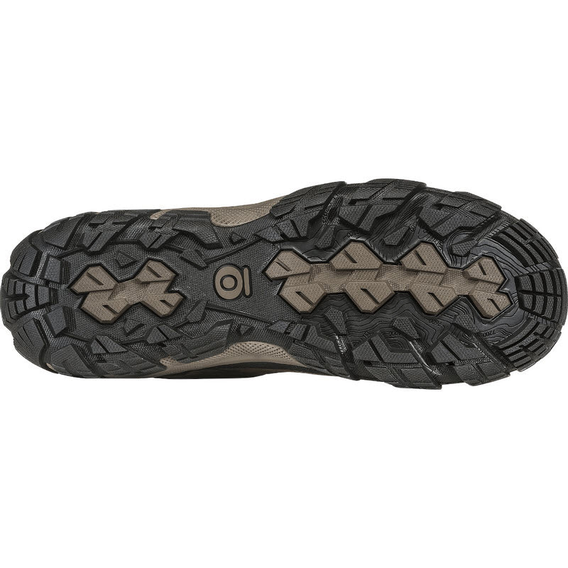 Sole of an Oboz Sawtooth X Mid Waterproof hiking boot displaying its tread pattern.