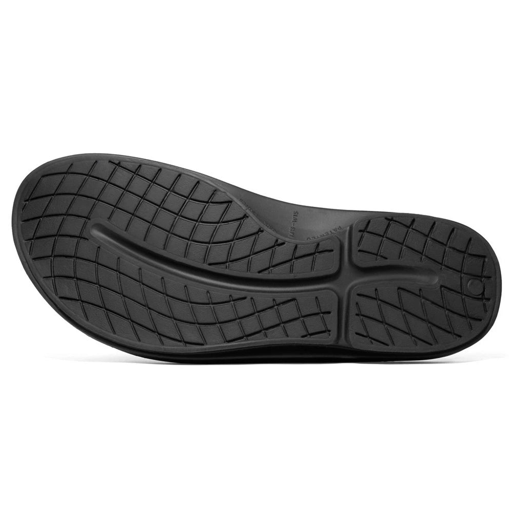 Oofos black athletic shoe sole with tread pattern.