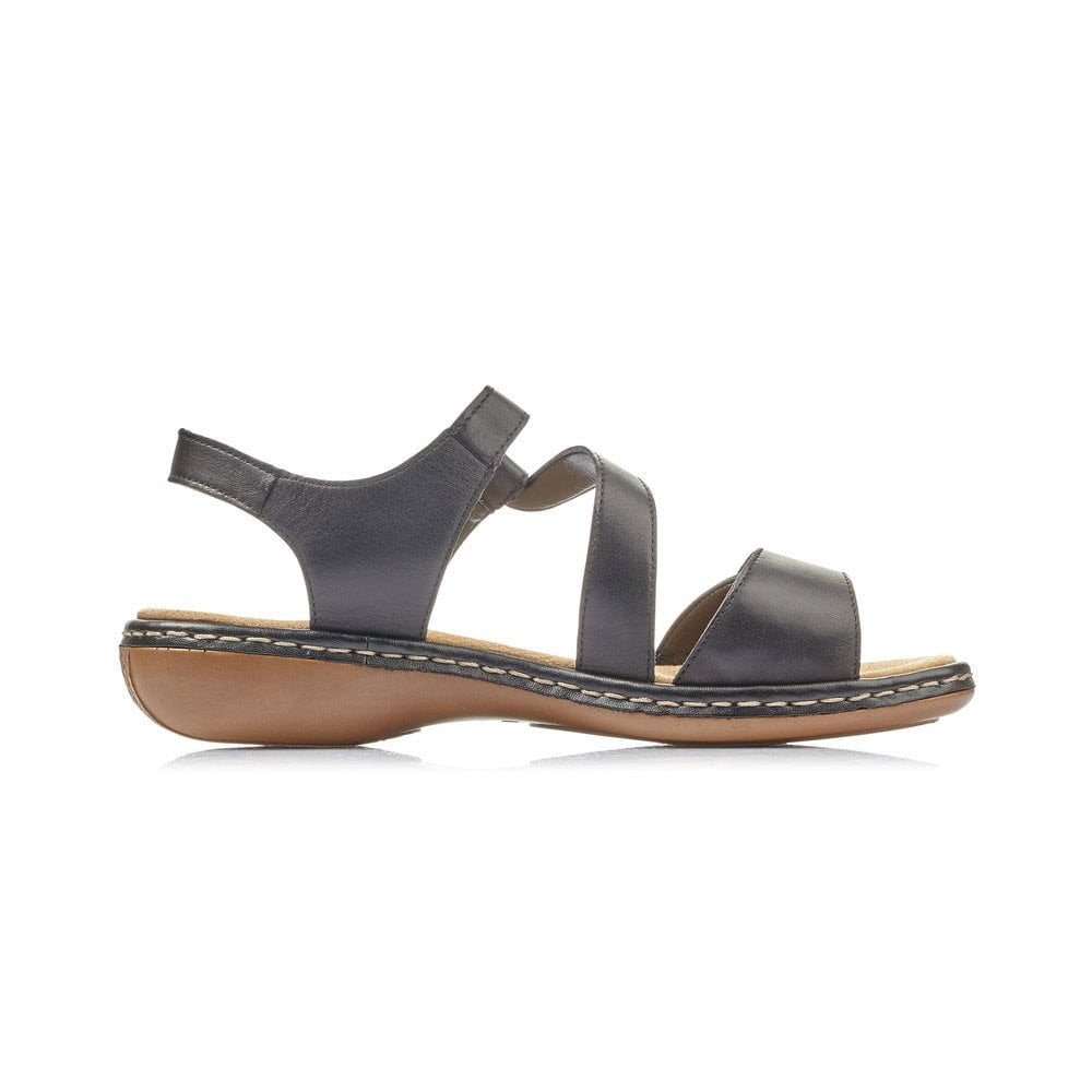 Side view of a ladies&#39; black Rieker Comfort Z Strap Sandal with hook and loop fastening straps on a white background.