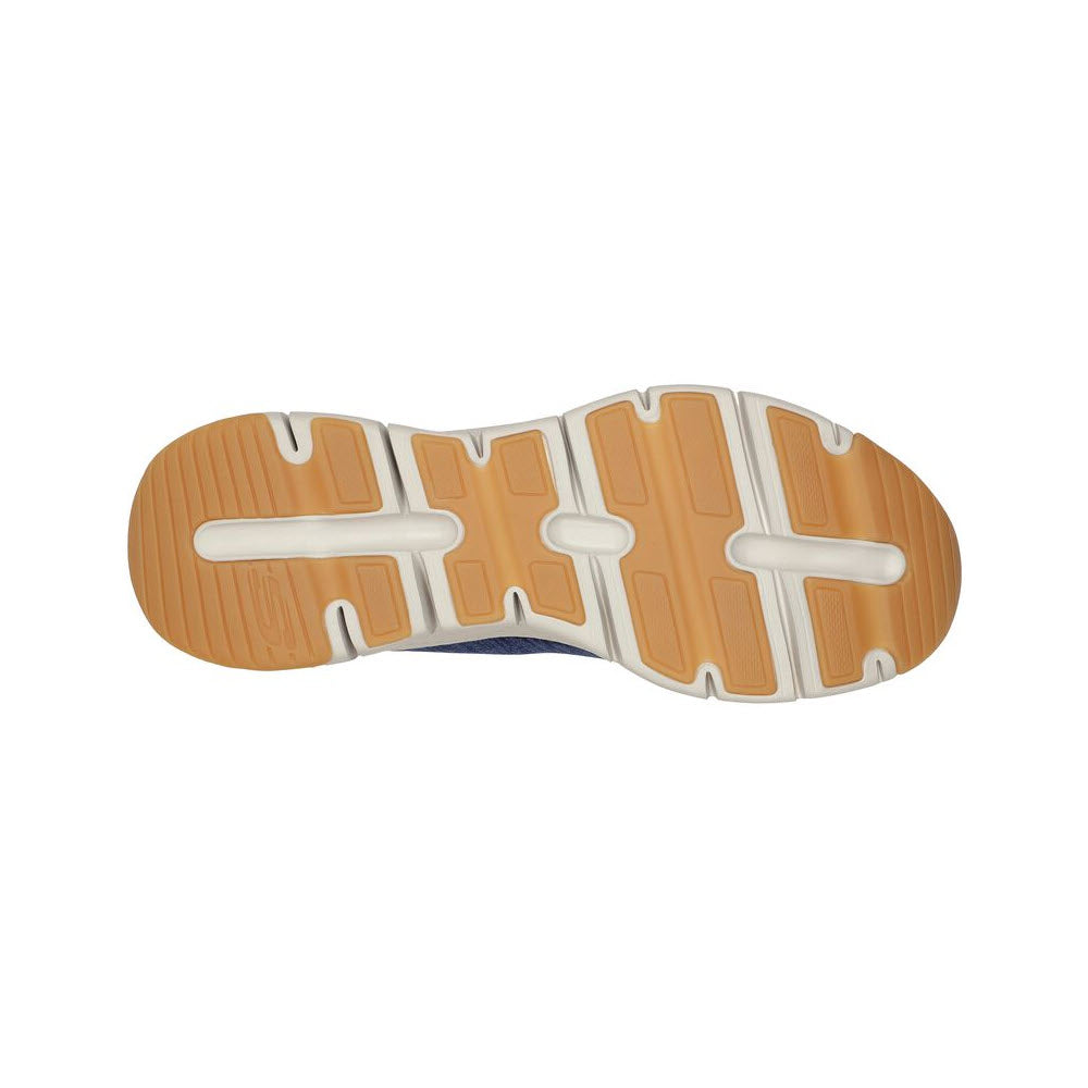 A sole of a Skechers Arch Fit Waveport Navy shoe with a tan and white tread pattern.