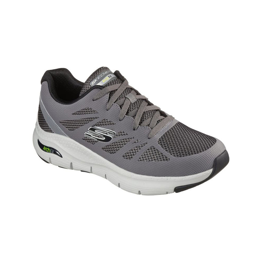 A single gray men’s Skechers Arch Fit Charge Back Charcoal/Black athletic running shoe with a removable insole on a white background.