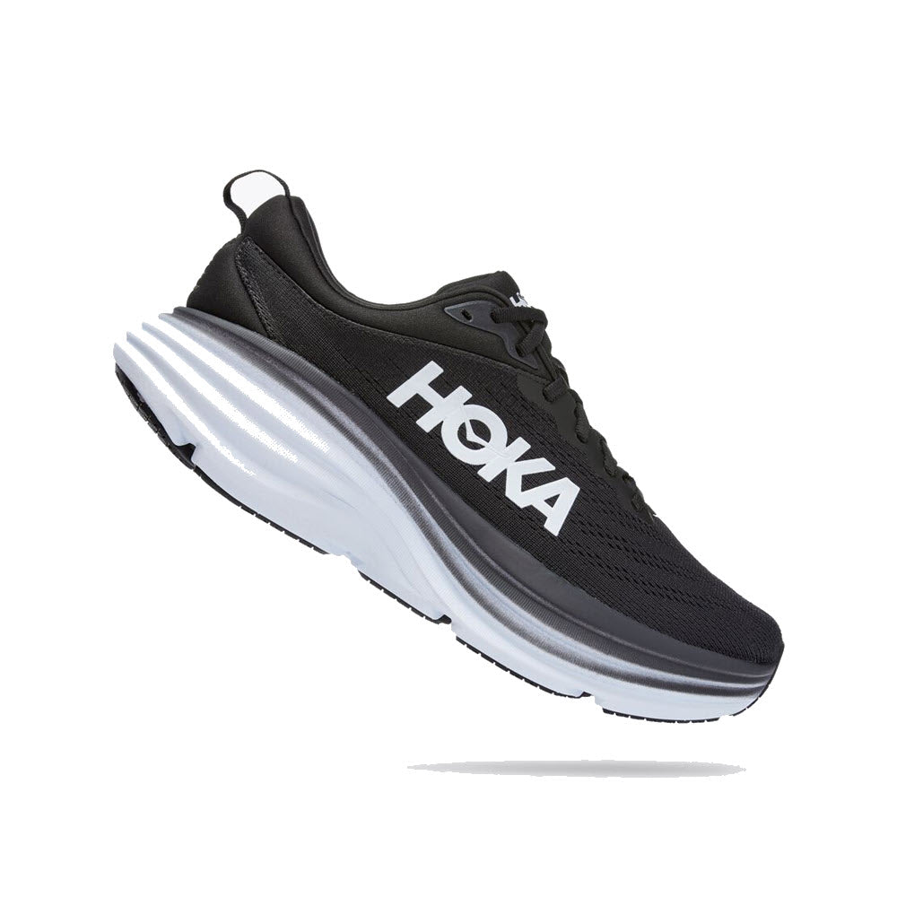A single black and white Hoka Bondi running shoe with a thick, layered sole, viewed from the side against a white background.