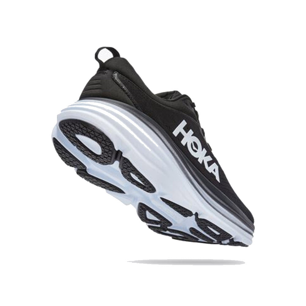 A single HOKA BONDI 8 BLACK/WHITE - MENS running shoe with a thick white sole and black upper, angled to show the side profile.
