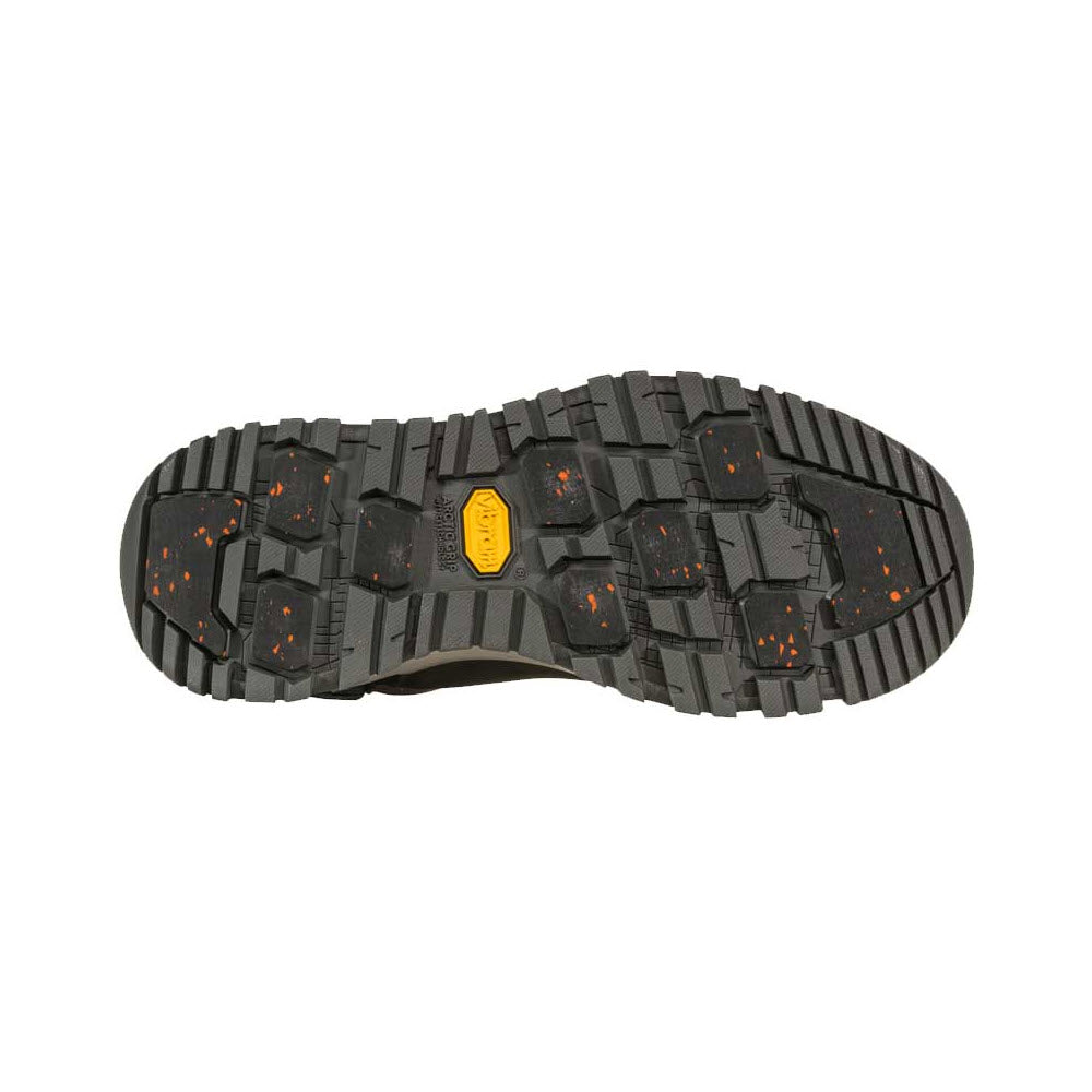 Bottom view of a rugged black shoe sole with intricate tread pattern and an orange logo in the center, featuring OBOZ B-DRY waterproofing.