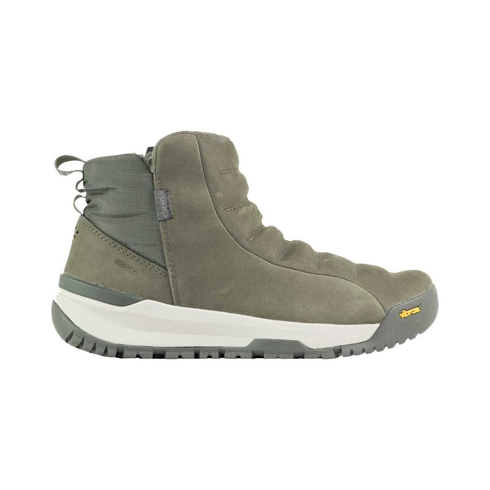Oboz olive green hiking boot with a high ankle design, featuring gray and white soles and a small yellow logo on the side, equipped with B-DRY waterproofing.
