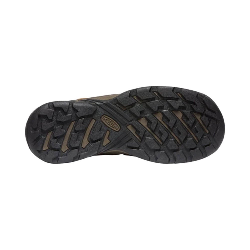 Bottom view of a black Keen KEENDRY waterproof hiking shoe sole with a rugged tread pattern.