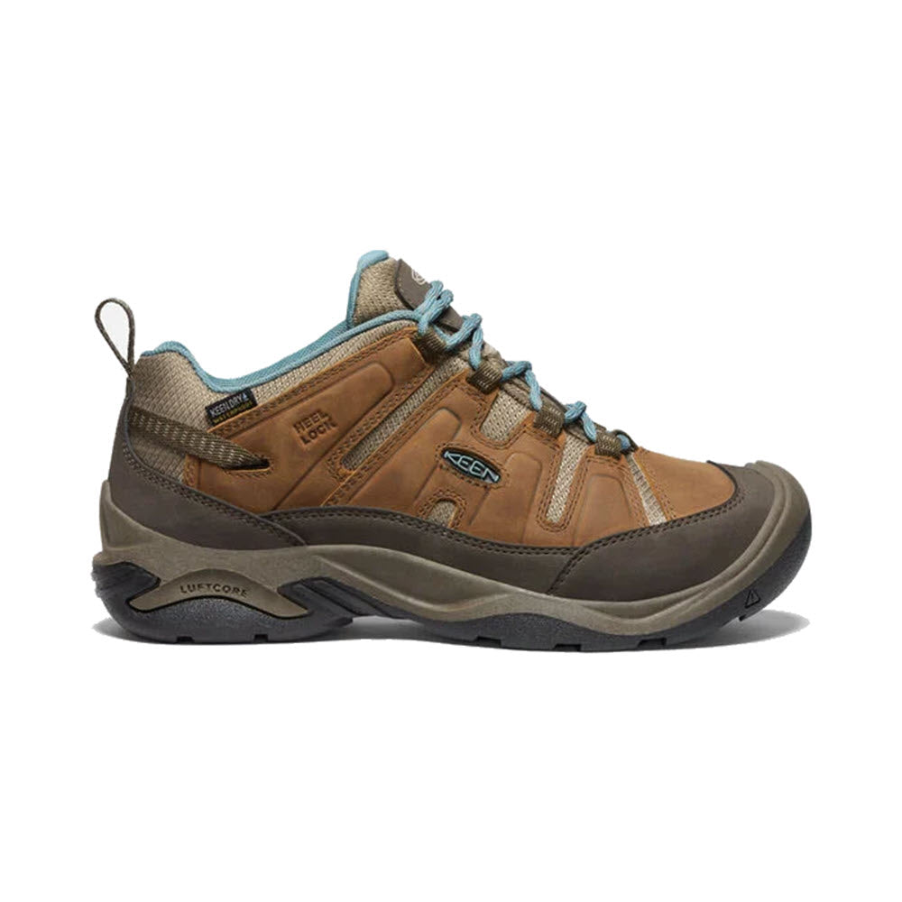 A single KEEN CIRCADIA WP SYRUP/NORTH ATLANTIC - WOMENS featuring a brown leather upper with gray and teal accents, enhanced with KEENDRY waterproof technology, set against a white background.