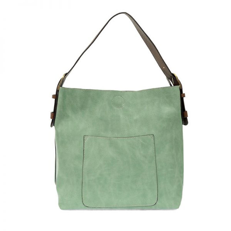 Green Joy Susan classic hobo bag with external pocket and vegan leather straps.