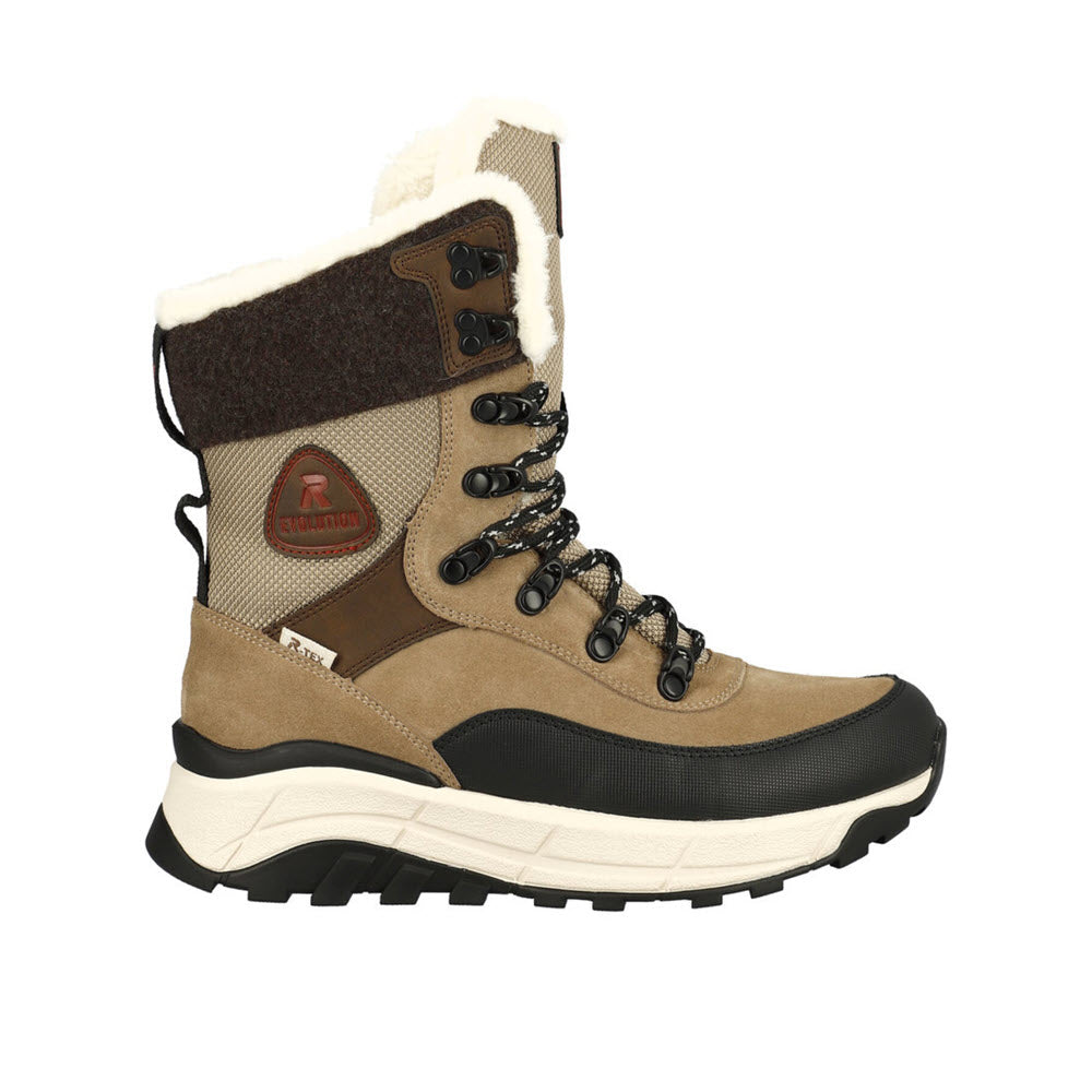 A Revolution winter hiking boot with brown and cream colors, featuring a fur-lined top, lace-up front, and Fiber-Grip sole, isolated on a white background.