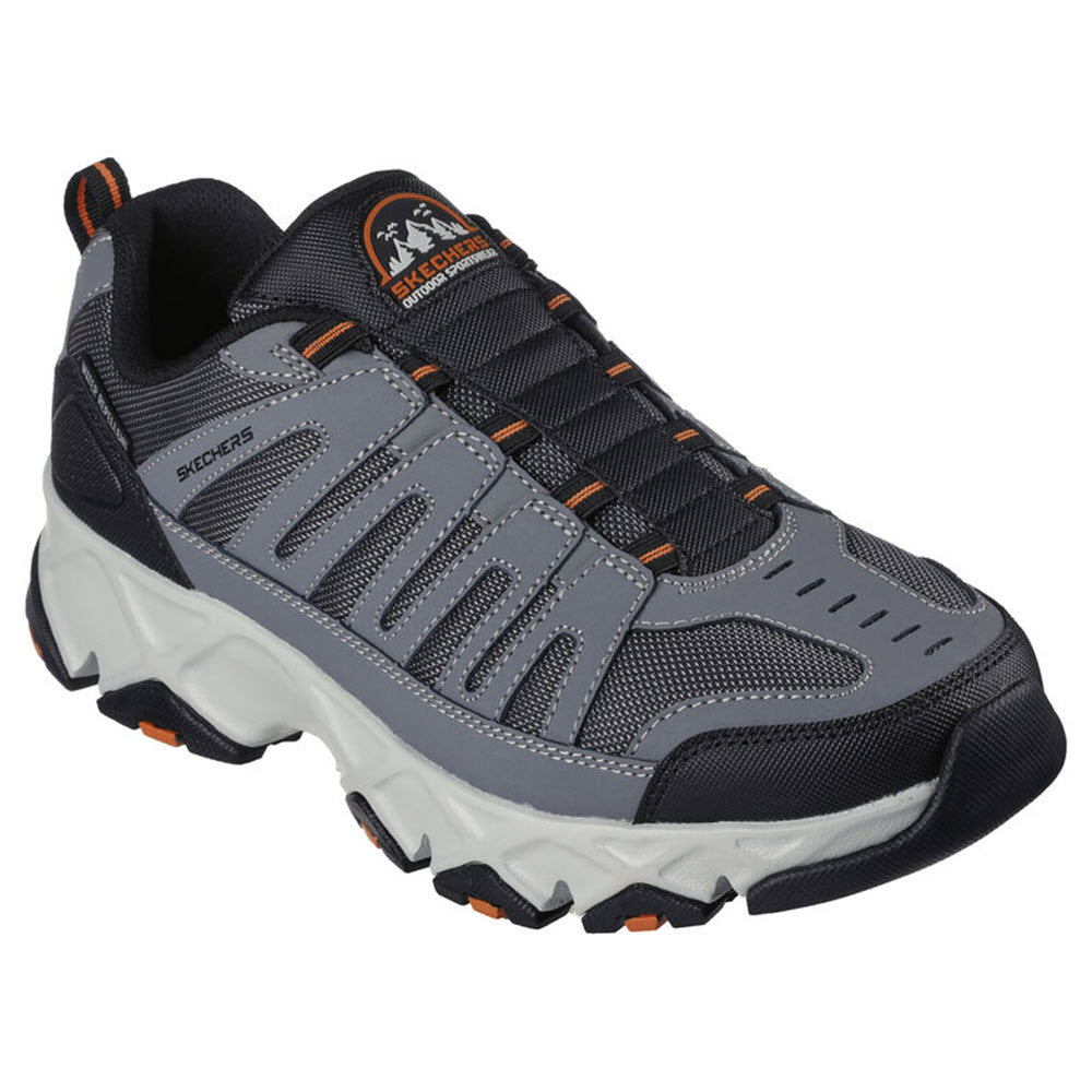 A single gray Skechers Crossbar outdoor trail running shoe with orange accents and Air-Cooled Memory Foam.