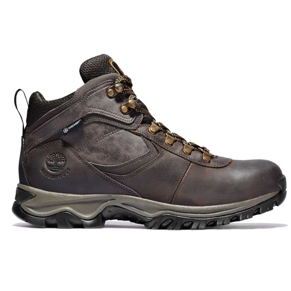 A single rugged brown Timberland Mt. Maddsen Mid Leather Waterproof Dark Brown hiking boot with metal eyelets and a thick rubber sole, featuring a prominent logo on the side.