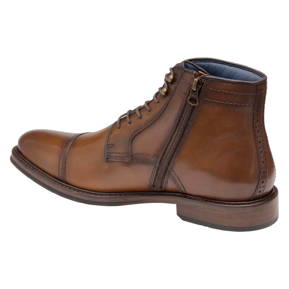 A single dark tan Johnston &amp; Murphy XC Flex Raleigh Cap Toe Zip dress boot with brogue details, laces, and a side zipper.